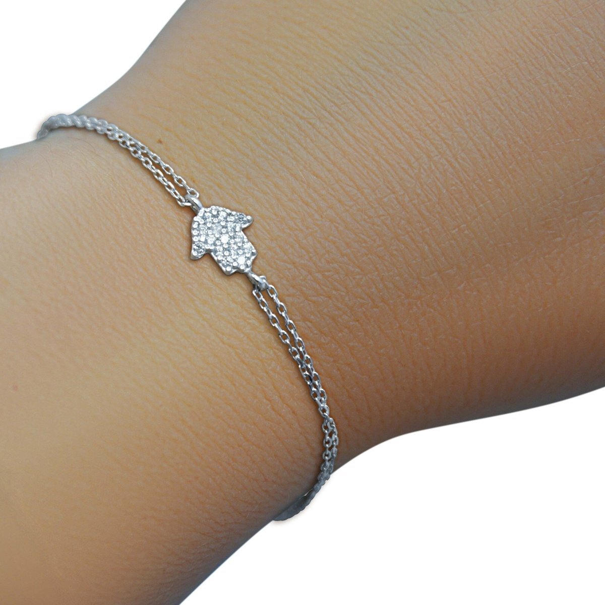 Silver hamsa bracelet with cubic zirconia pave setting by Alef Bet