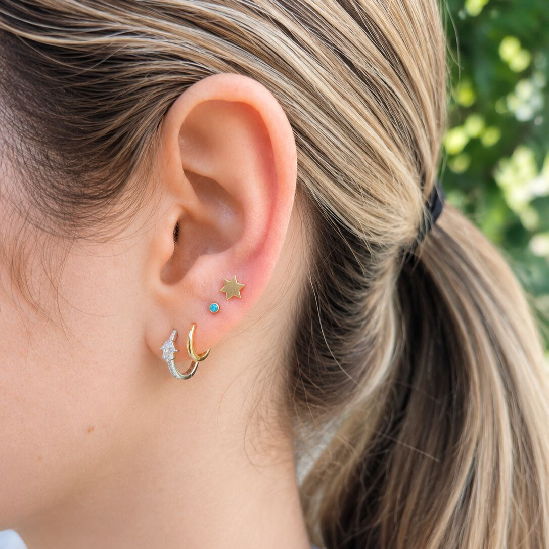 14k gold Jewish star studs featuring classic six-point Star of David design by Alef Bet