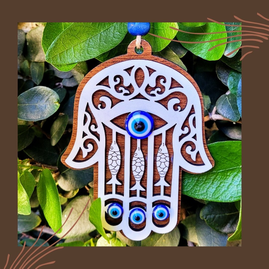 Handmade wood amulet with evil eye and hamsa hand for guidance and protection