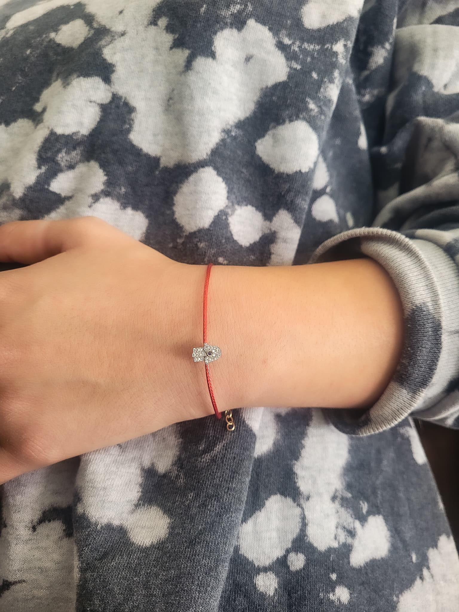 What does it mean to wear a red string on your wrist? - Alef Bet by Paula