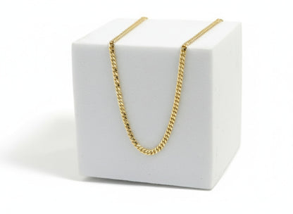 Cuban link chain in 14k gold with interlocking solid links by Alef Bet