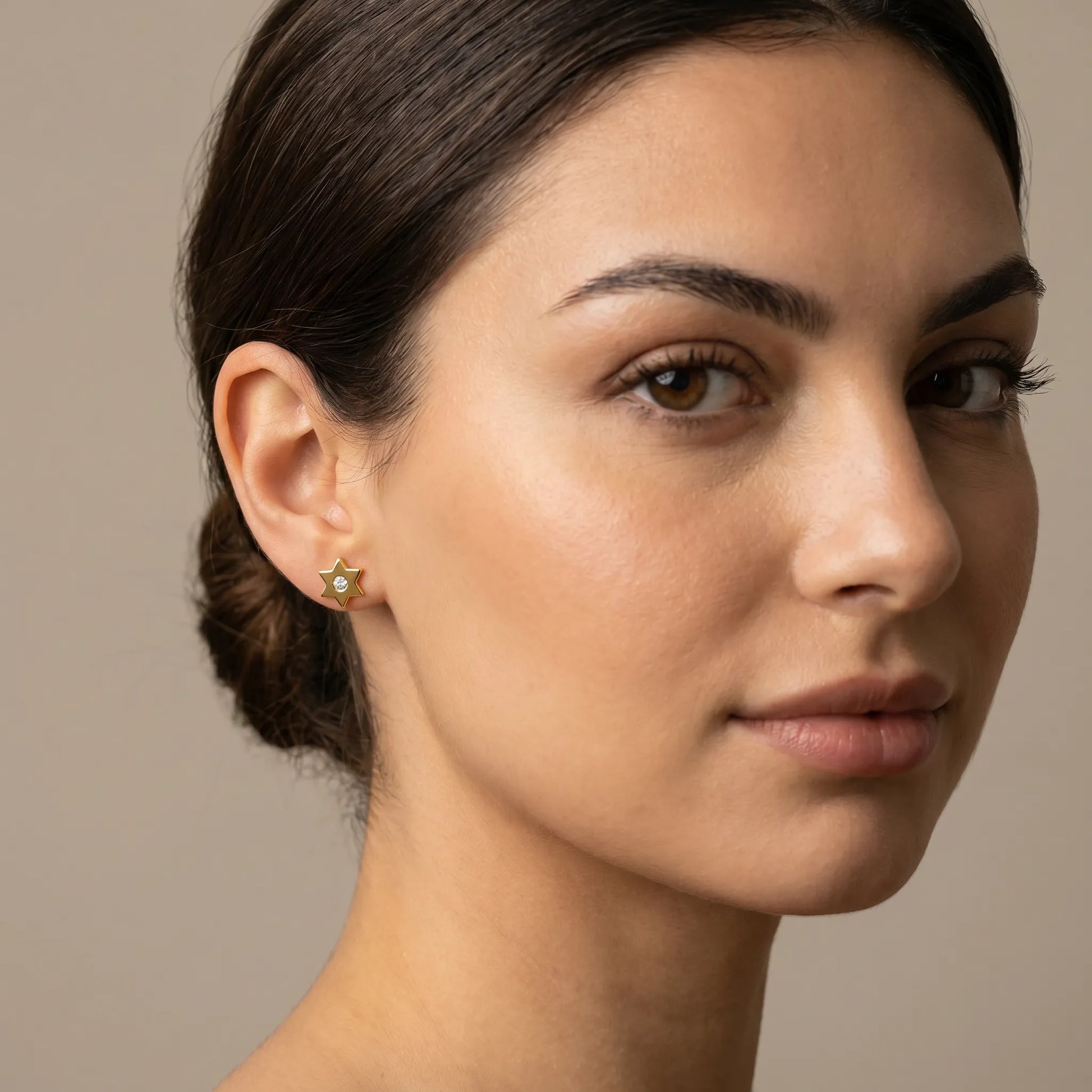 14k gold Star of David stud earrings featuring bezel-set diamond details by Alef Bet