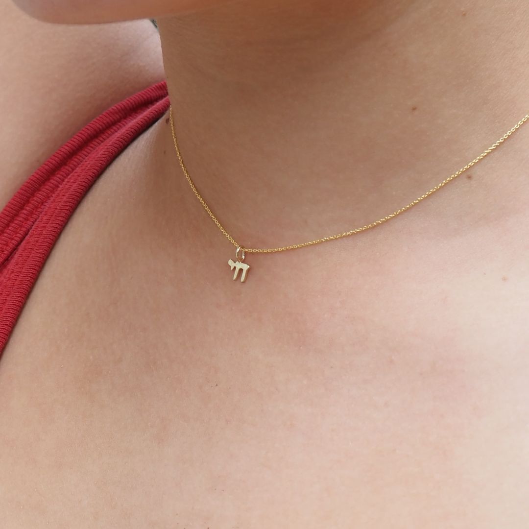 14k gold mini chai necklace with polished finish by Alef Bet