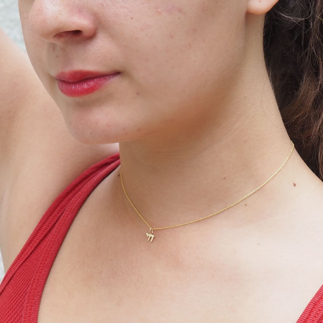 14k gold mini chai necklace with polished finish by Alef Bet