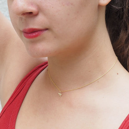 14k gold mini chai necklace with polished finish by Alef Bet