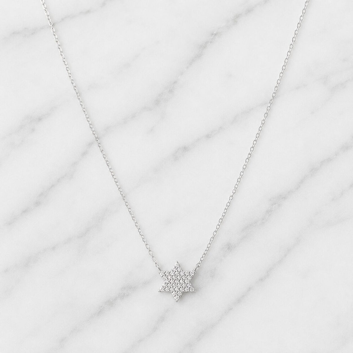 Sterling silver Jewish star pendant with pave-set cubic zirconia by Alef Bet