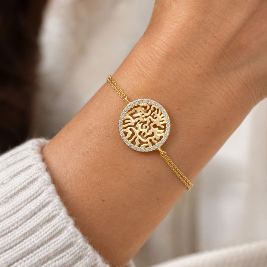 Sterling silver Shema Israel Hebrew prayer bracelet adorned with cubic zirconia, adjustable length, and meaningful symbolism.