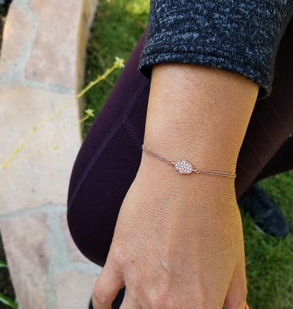 Rose gold hamsa bracelet with high-polish finish and pave CZ accents by Alef Bet