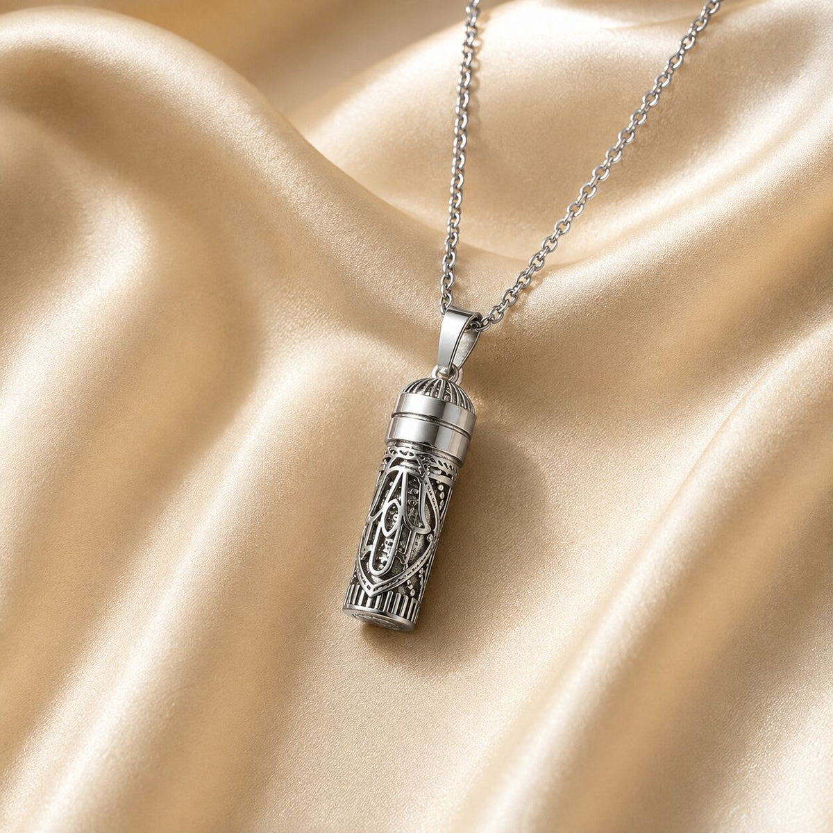 Sterling silver hamsa mezuzah necklace with negative space design by Alef Bet