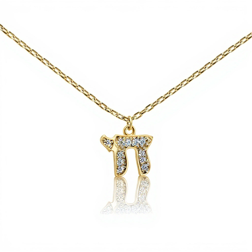 Chai pendant in yellow gold with pave-set cubic zirconia stones by Alef Bet