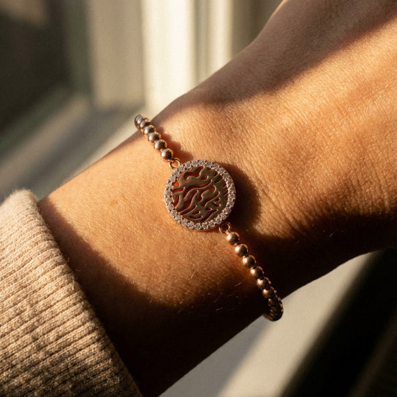 Shema Israel rose gold bracelet with engraved Hebrew letter beads by Alef Bet
