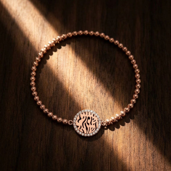 Shema Israel bracelet in rose gold with polished bead accents by Alef Bet