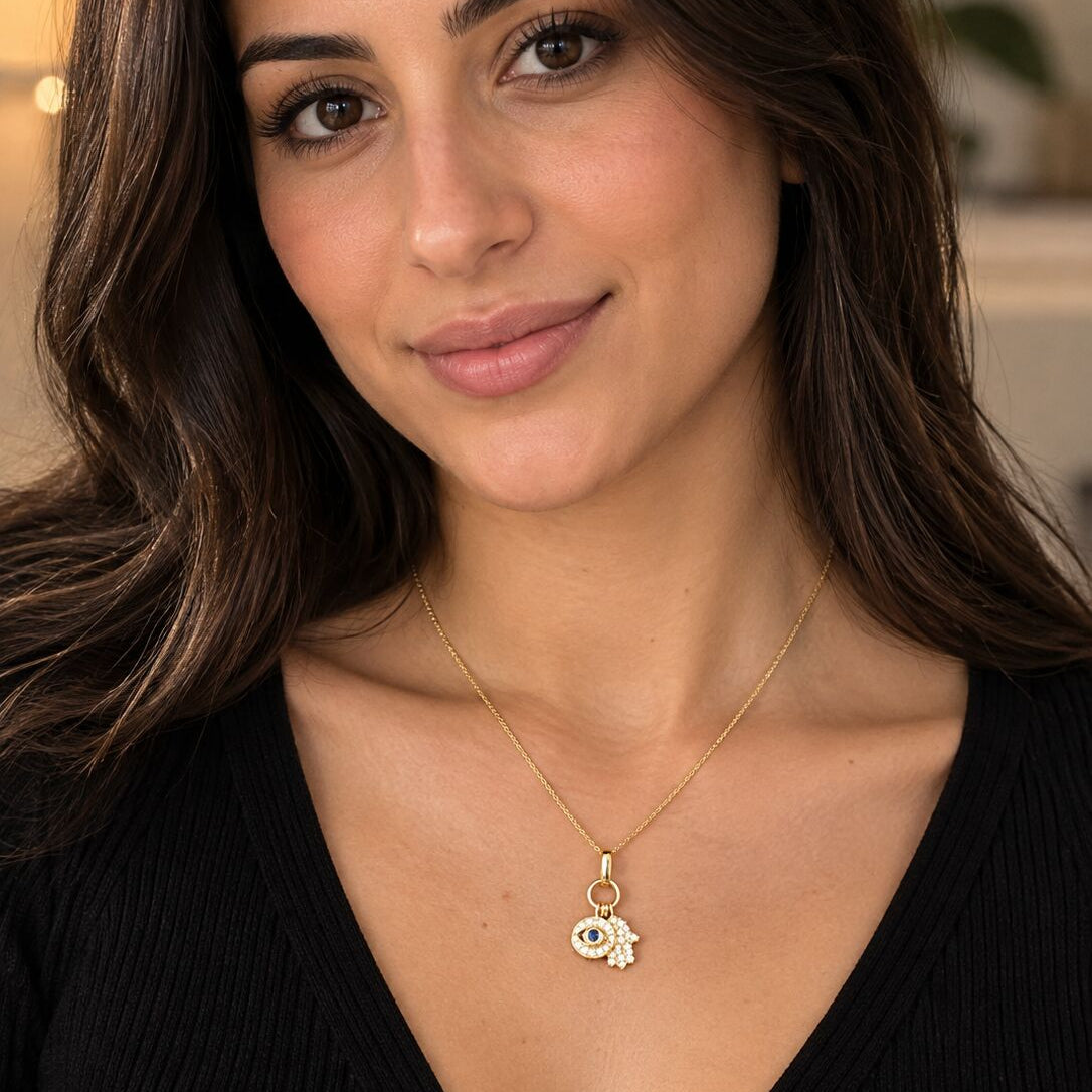 14K gold necklace with hamsa and evil eye charms, sapphire and diamond inlay by Alef Bet