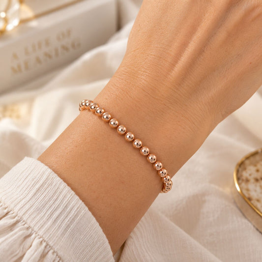 Rose gold beaded bracelet 5mm with polished round beads by Alef Bet
