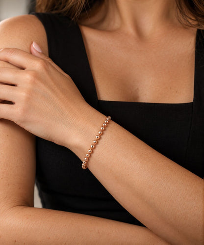 5mm Round Bead Stretch Bracelet in 14K Rose Gold Filled, waterproof and stackable for effortless everyday wear