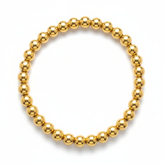6mm beaded bracelet in gold filled with high-polish finish by Alef Bet