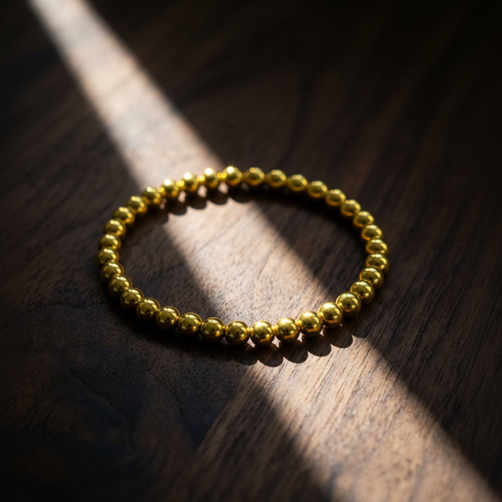 Gold filled 6mm bead bracelet featuring smooth spherical beads by Alef Bet