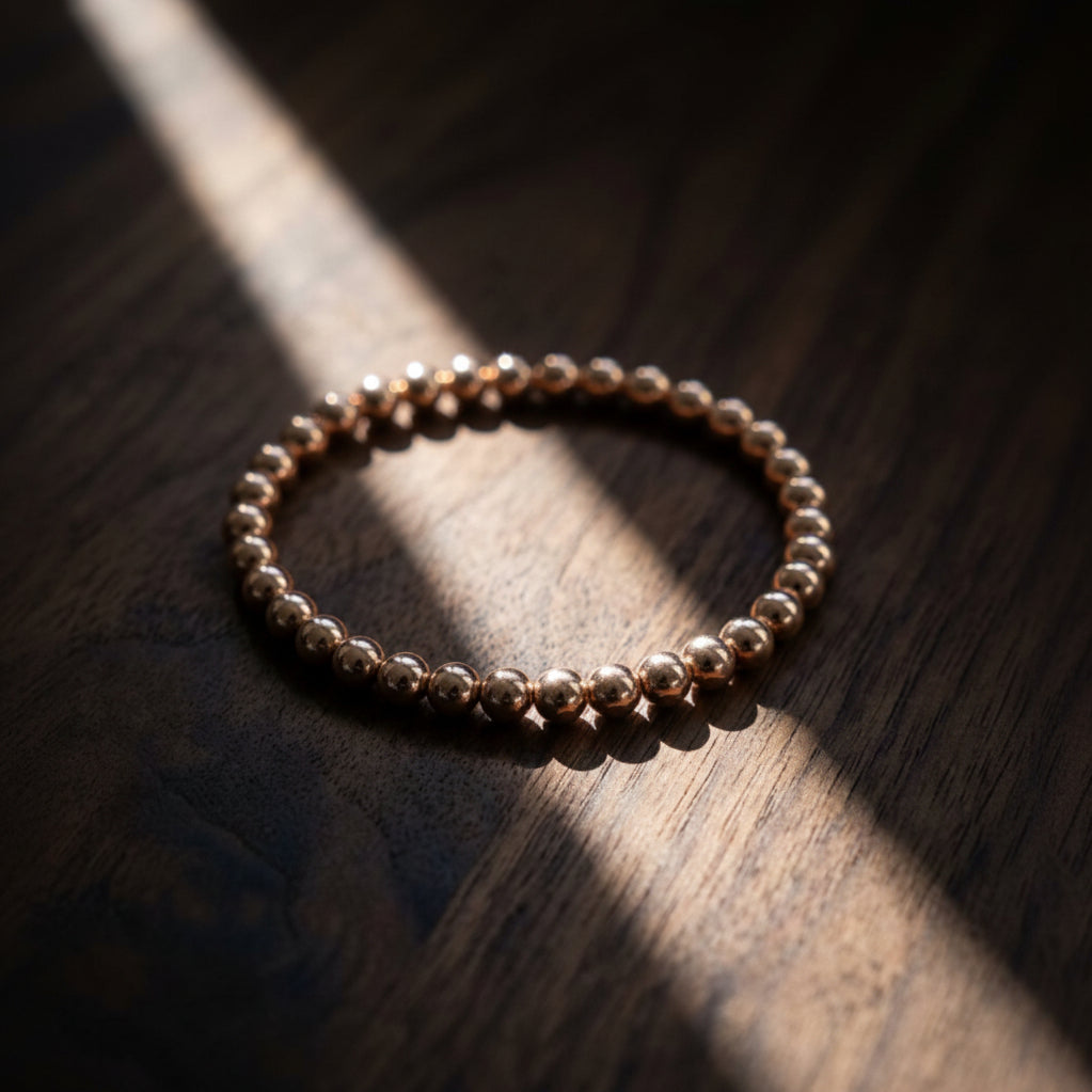 6mm rose gold beaded bracelet with uniform spherical beads by Alef Bet
