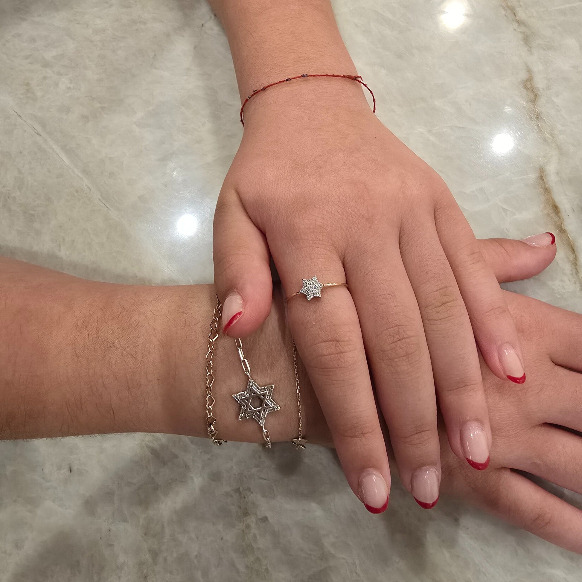 Adjustable Star of David ring in 14k gold featuring diamond accents by Alef Bet