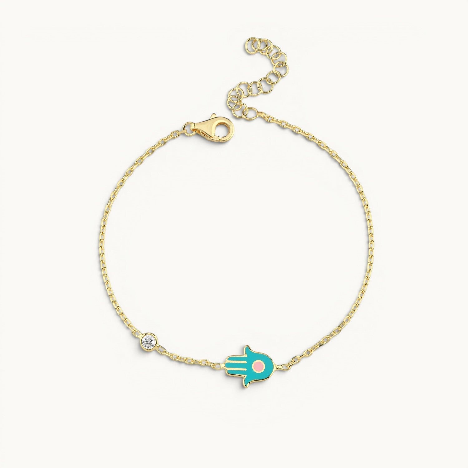 Yellow gold pave huggie earrings with turquoise stones by Alef Bet