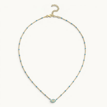 Evil eye pendant in yellow gold with turquoise stone and pave diamond accents by Alef Bet