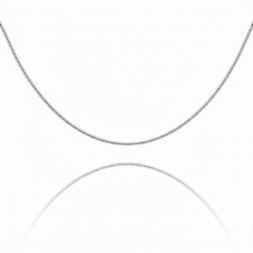 A vibrant sunset over a serene lake with silhouettes of trees, reflecting warm colors on the water's surface.