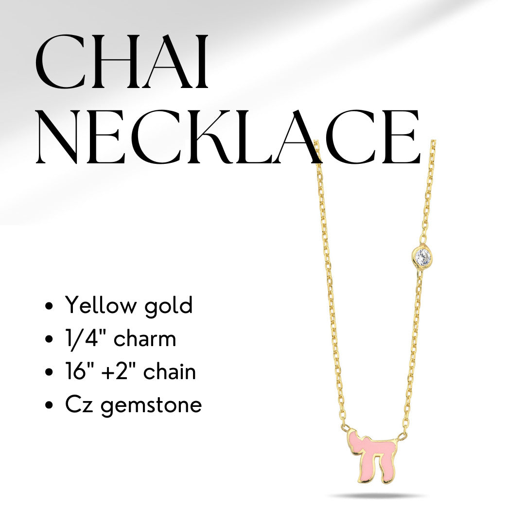 A stunning Chai Hebrew necklace featuring a cubic zircon gemstone in pink or blue, available in sterling silver or gold plating.