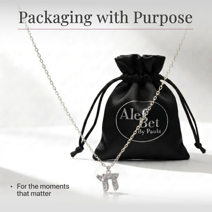 Sterling silver chai necklace with sparkling CZ stones, front view by Alef Bet