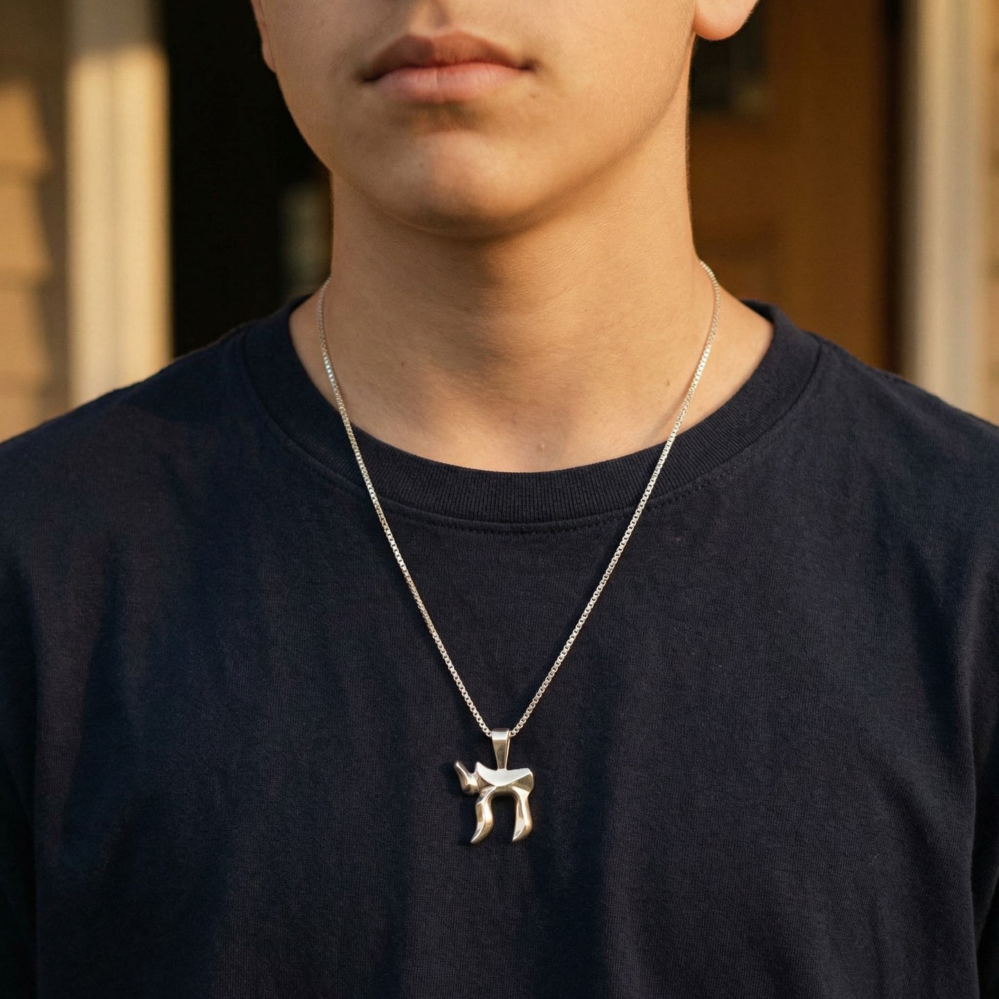 Sterling silver Chai necklace in Hebrew, ideal for Bar/Bat Mitzvahs, symbolizes blessings of a long, happy life. Box chain included.