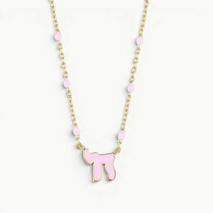 Chai necklace in pink with beaded detailing by Alef Bet