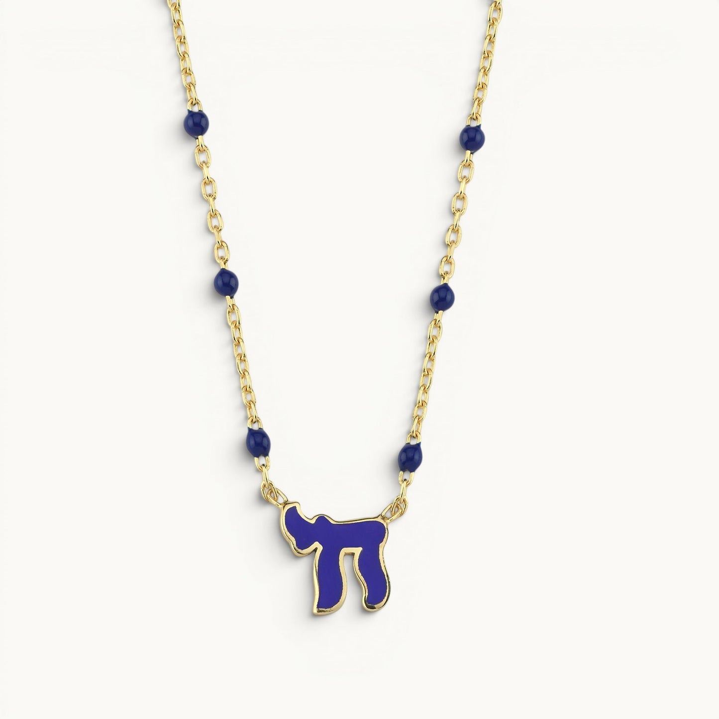 Chai necklace in 14k gold with colorful enamel detail by Alef Bet