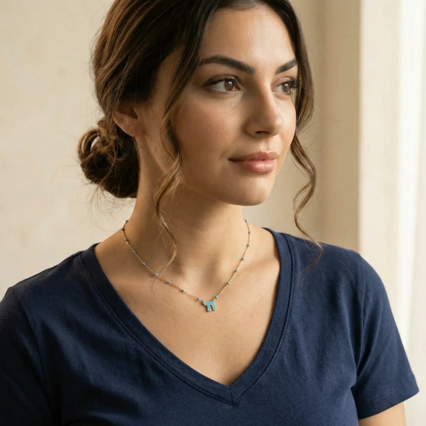 Colorful enamel chai necklace on beaded gold chain featuring light blue detail by Alef Bet
