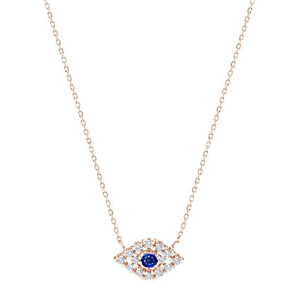 Dainty diamond evil eye necklace in 14k yellow gold with pave-set round diamonds by Alef Bet