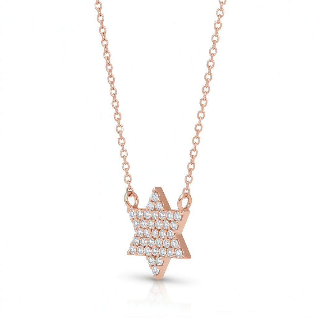 Star of David necklace in 14k gold with pave-set diamonds by Alef Bet