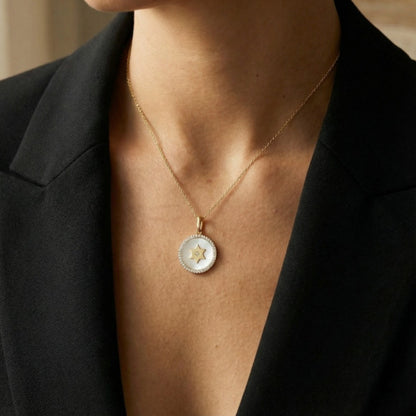 White gold Star of David necklace with pave diamond border and luminous mother of pearl center by Alef Bet