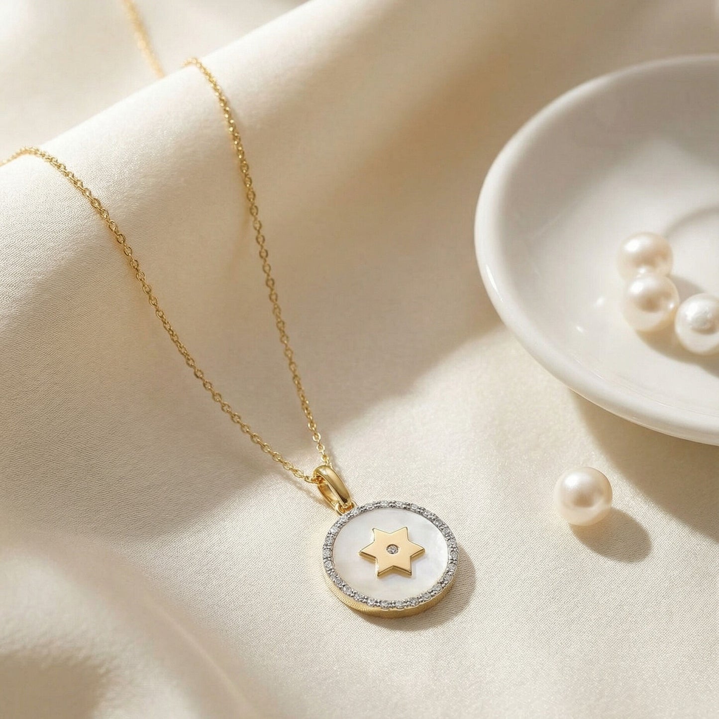 Star of David pendant necklace in white gold with diamond frame and natural mother of pearl stone by Alef Bet
