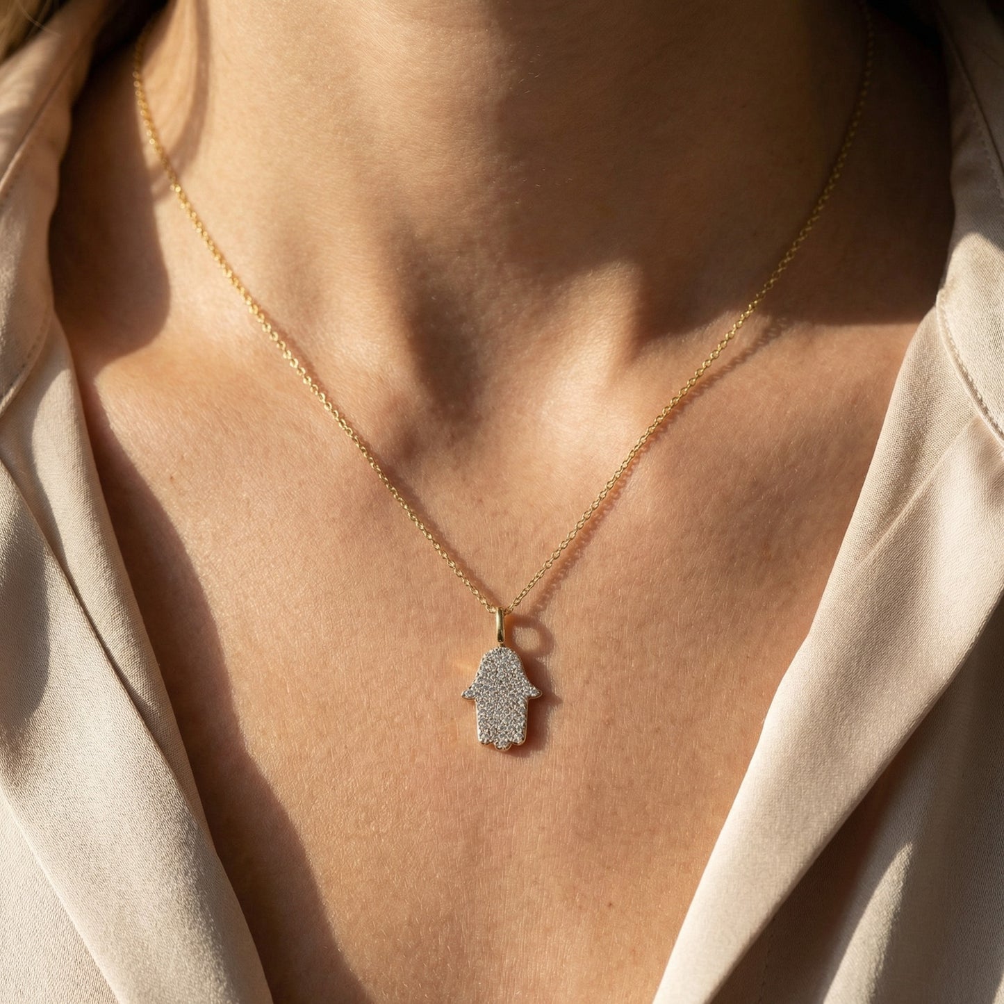 Pave diamond hamsa charm in 14k white gold on 16 inch chain by Alef Bet