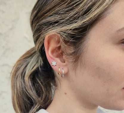Star of David diamond stud earrings in 14k yellow gold, front view by Alef Bet