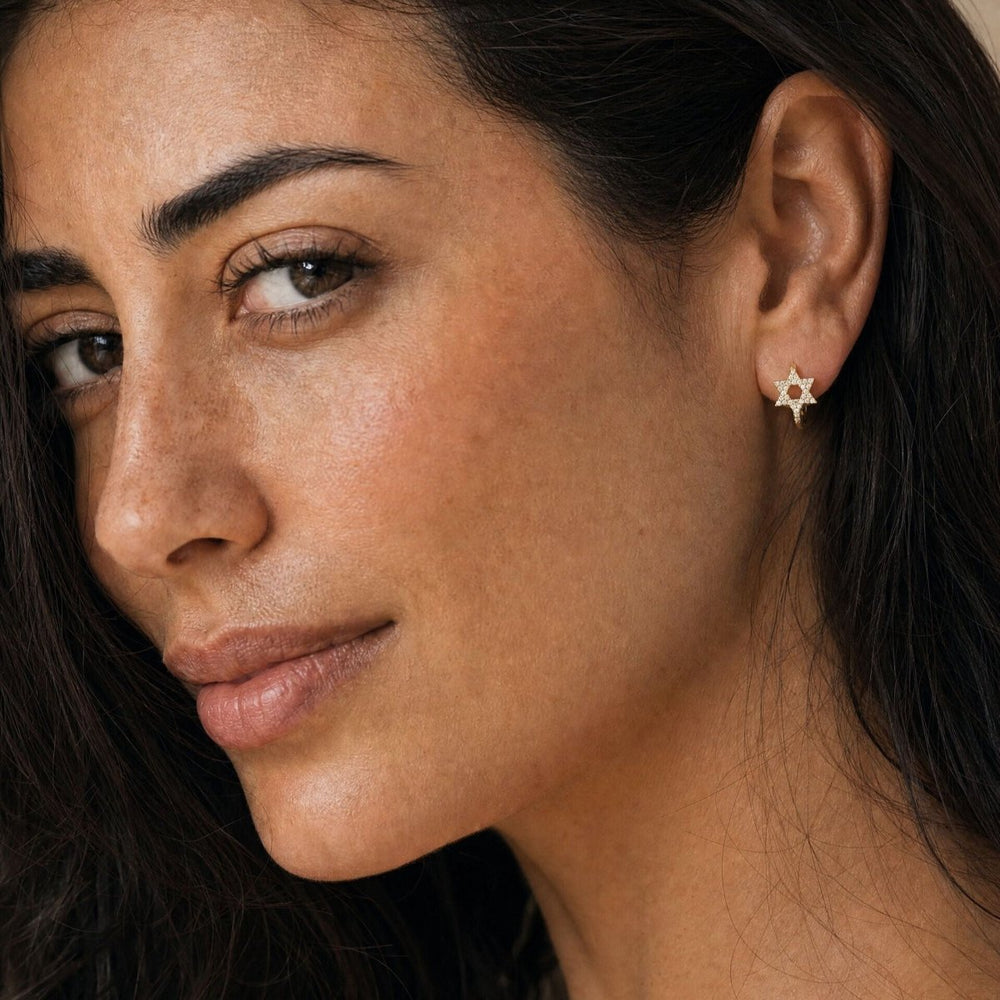 Diamond Star of David Huggie Earrings in 14k Yellow Gold, effortlessly elegant every day