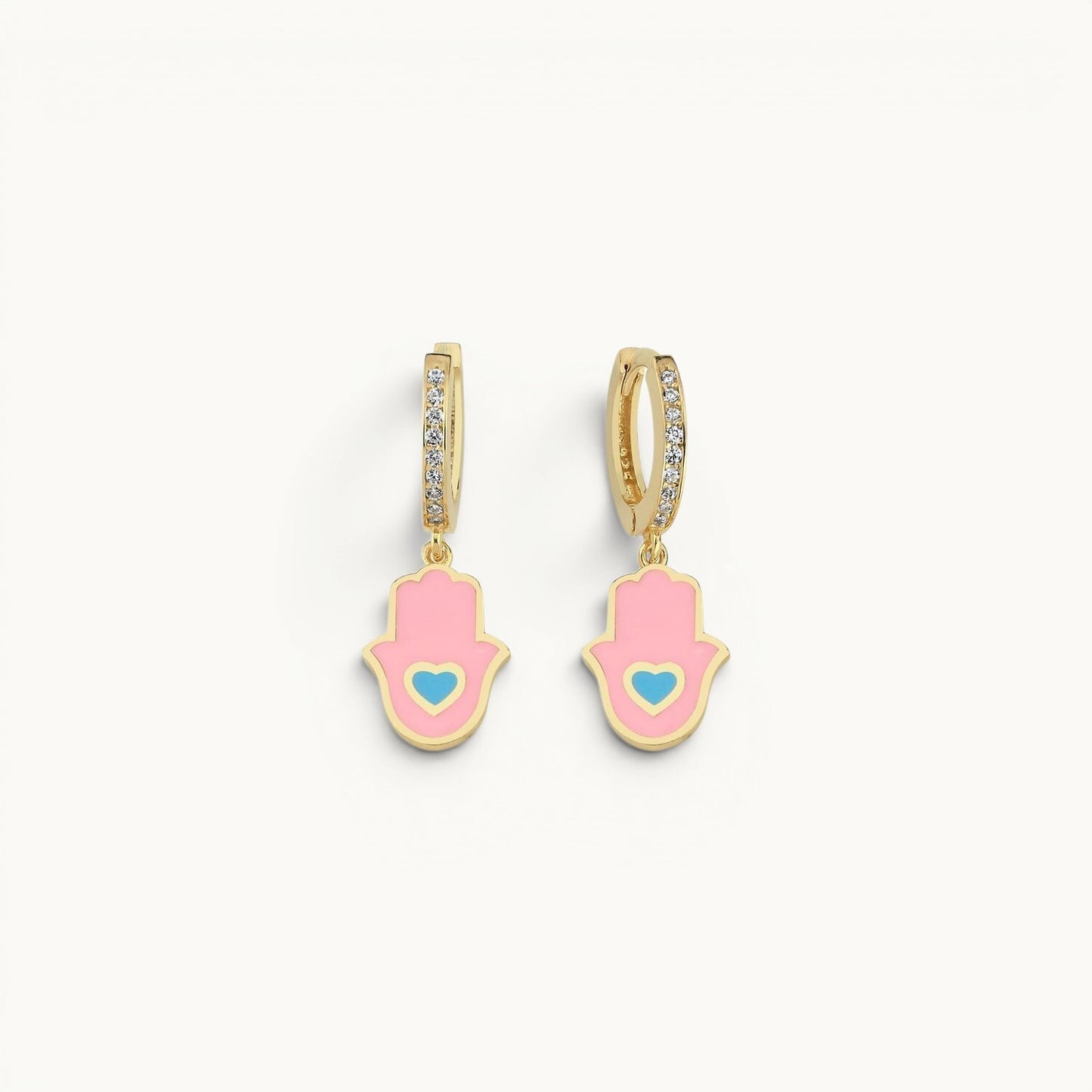Hamsa huggie earrings in pink enamel with cubic zirconia pave by Alef Bet