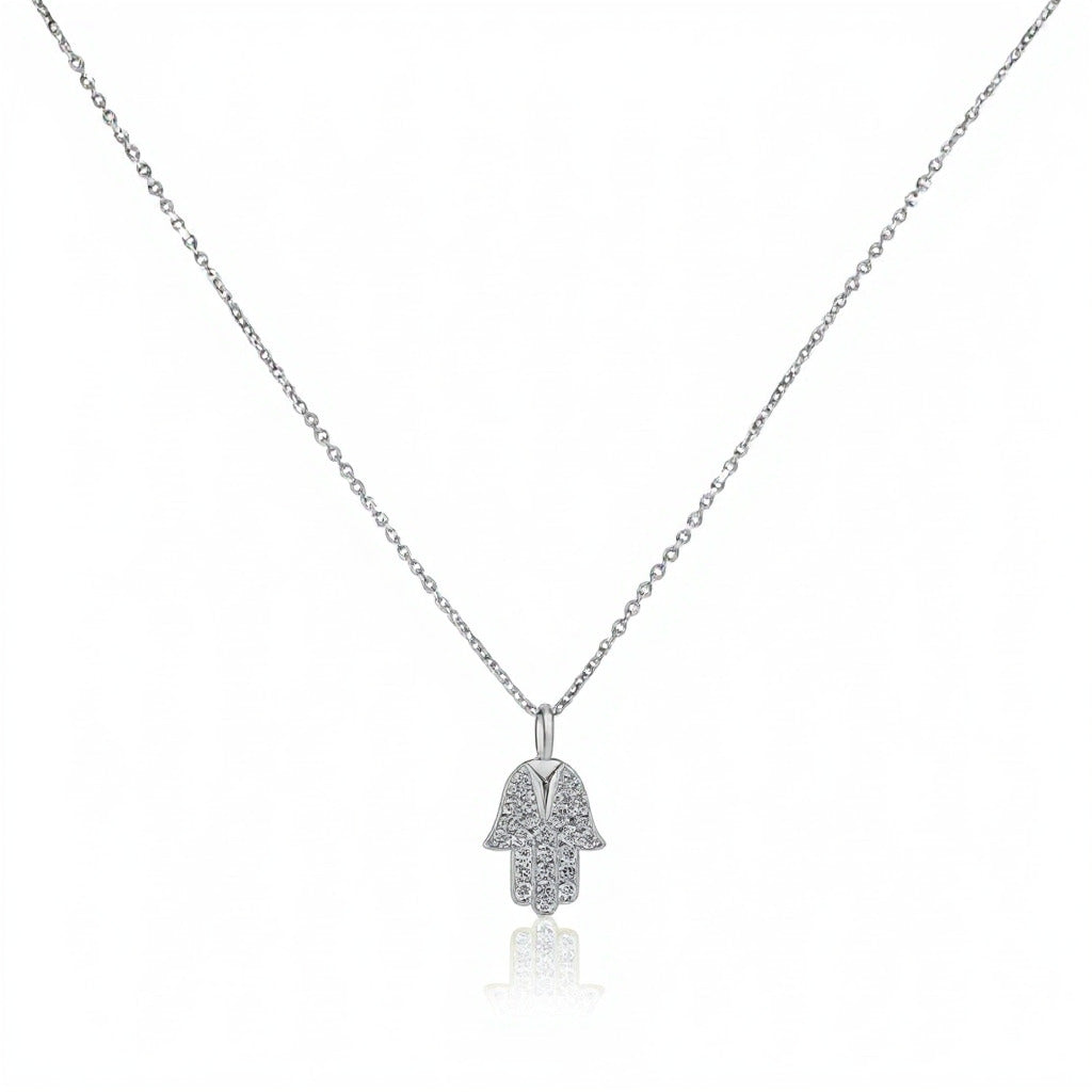 Diamond hamsa pendant in white gold with pave-set stones by Alef Bet