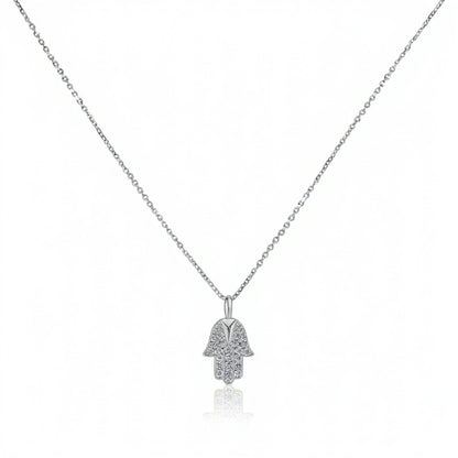 Diamond hamsa pendant in white gold with pave-set stones by Alef Bet