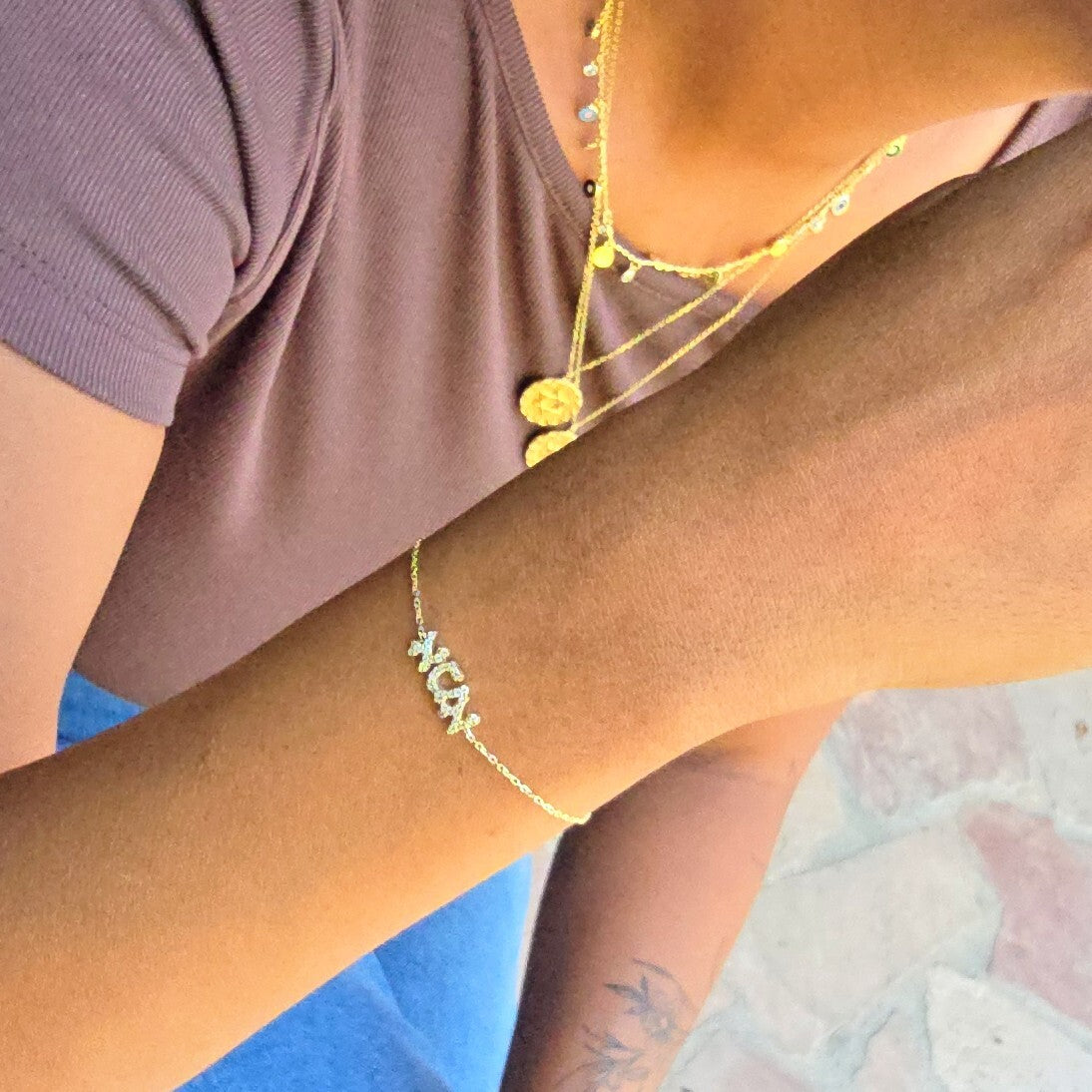 14k gold diamond Ema mother bracelet featuring bezel-set diamonds on polished gold by Alef Bet