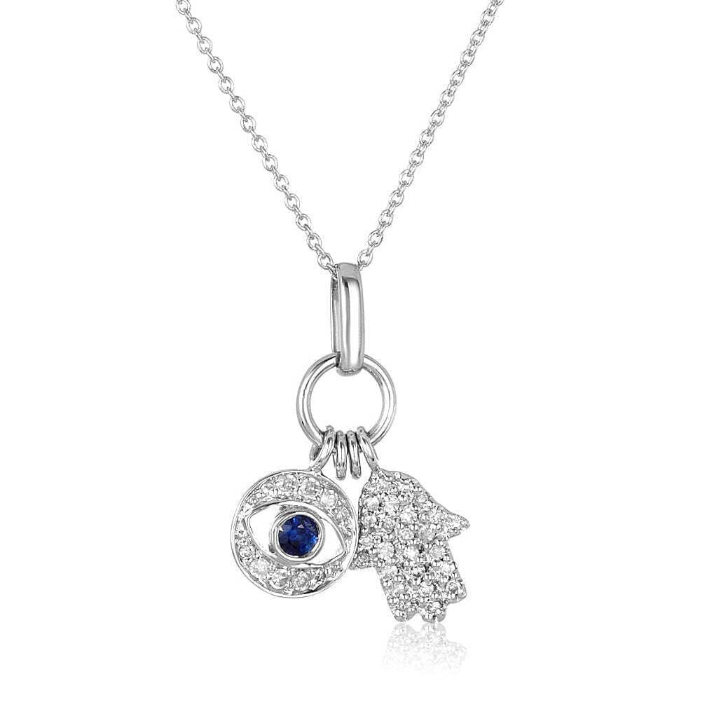 Hamsa and evil eye necklace in 14k gold with pave diamonds and sapphire accents by Alef Bet