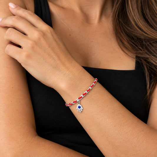 Hamsa charm bracelet in sterling silver with red string and blue evil eye by Alef Bet
