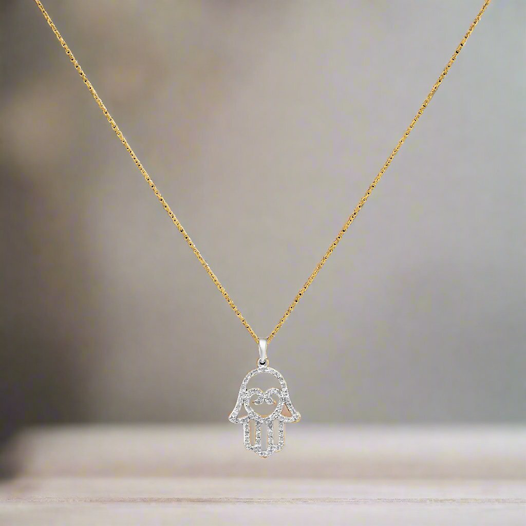 ALT text: 14k gold Hamsa and Heart Diamond Necklace with white gold chain, featuring .18ct diamonds and a meaningful design for love and protection.