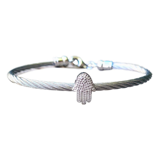 Hamsa bangle bracelet showcasing diamond pavé detail on protective hand motif by Alef Bet