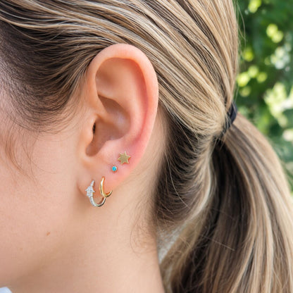 14k gold hamsa huggie earrings with pave diamond accents, back angle by Alef Bet