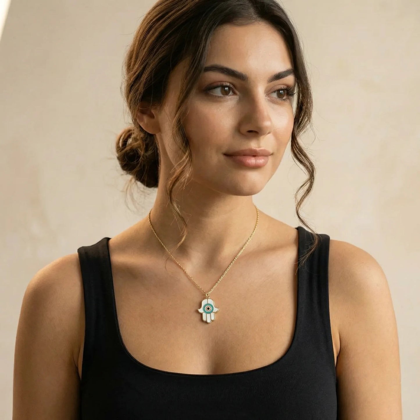 Gold hamsa charm necklace with vibrant enamel and double chain construction by Alef Bet