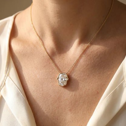 Hamsa Hand Pendant in 14k Yellow Gold, one lab grown diamond hand carved into the symbol of protection forever